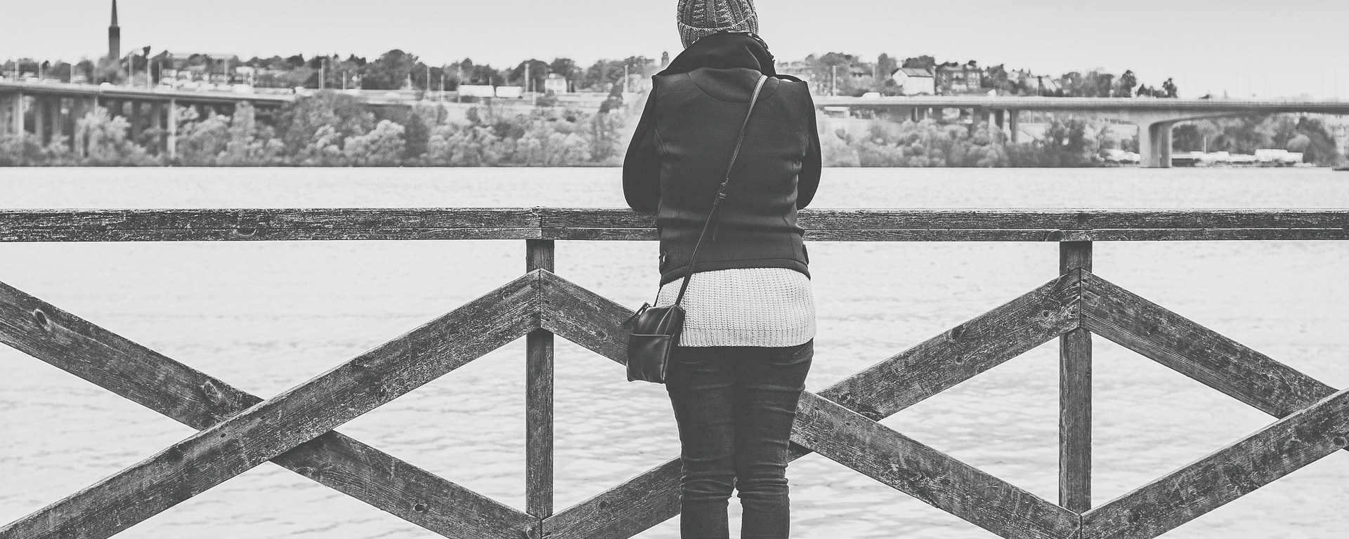 woman,view,stockholm,sweden,looking,out,thinking,wondering,future,past,problem,solution,planning,imaging,considering,girl,female,person,watching,clouds,water,sea,city,cityscape,hat,wood,fence,protection,outdoors,construction,depression,anxiety