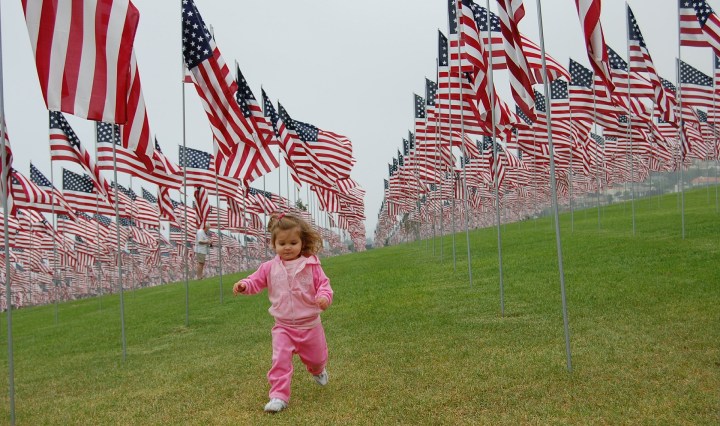 toddler,patriot,patriotic,girl,running,flags,usa,america,stars and stripes,lawn,grass,freedom,young,child,kid,happy,cute,childhood,outdoor,green,park,memorial day,veterans day,july 4th,princess,pink,DONCHARISMA
