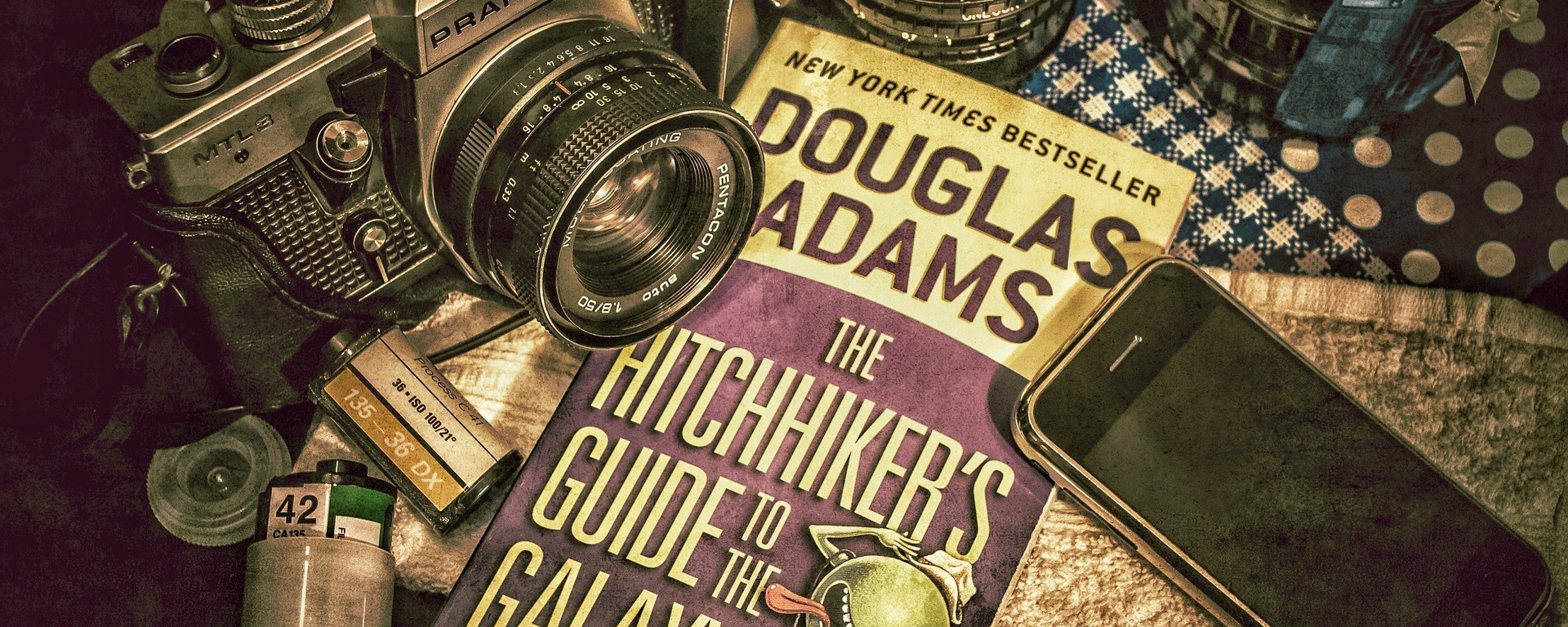douglas adams,hitchhikers,guide,galaxy,analog,film,photography,iphone,vintage,fisheye,towel,book,tea,cup,relaxation,hot,table,prepared,morning,DON CHARISMA